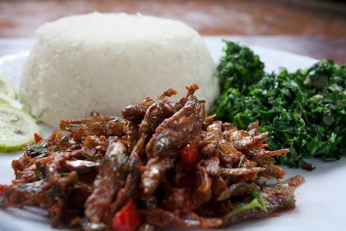 Delicious omena ugali with sukuma wiki on the side